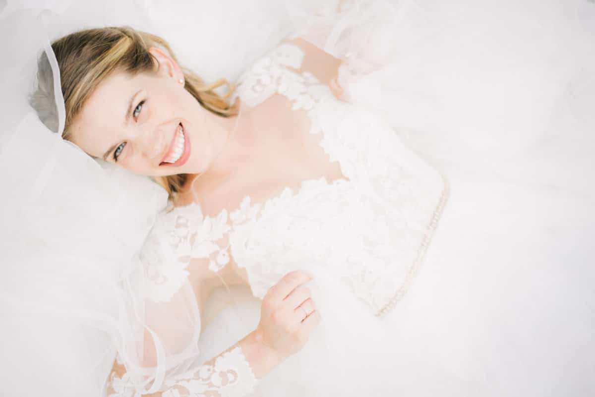 Bride in Hayley Paige gown at vegan château wedding in France photographed by Ben Yew