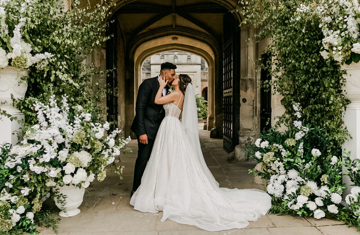 Naomi and Jordan kissing at Ashridge House wedding — HD Moments wedding film