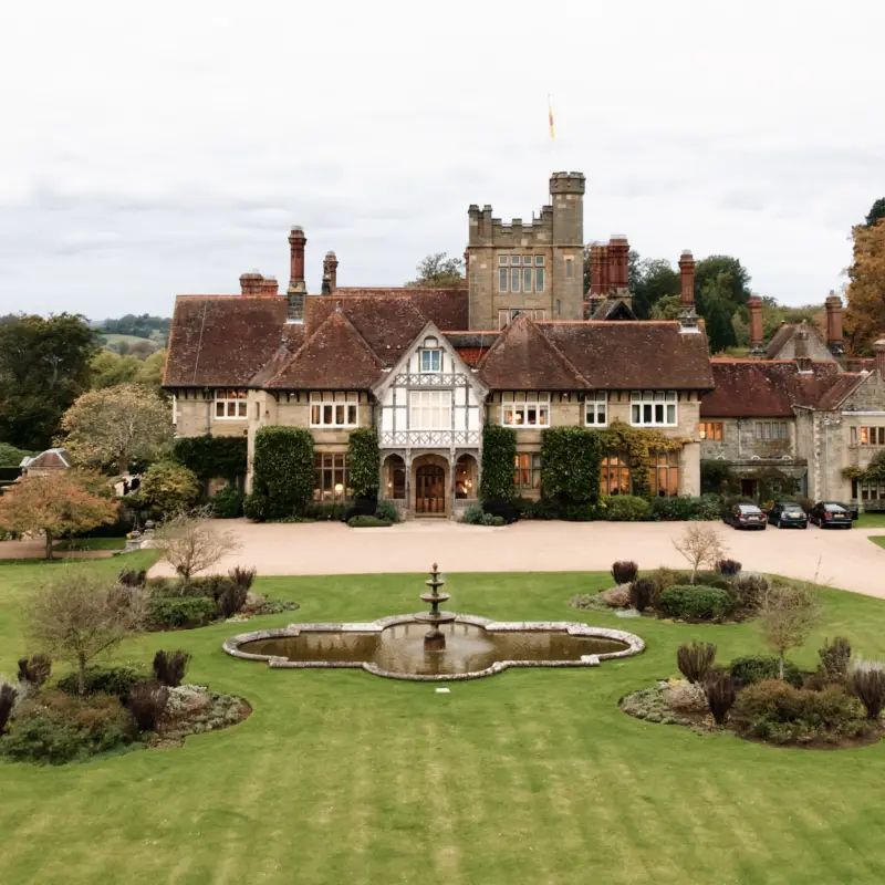 Elegant wedding ceremony at Cowdray House gardens
