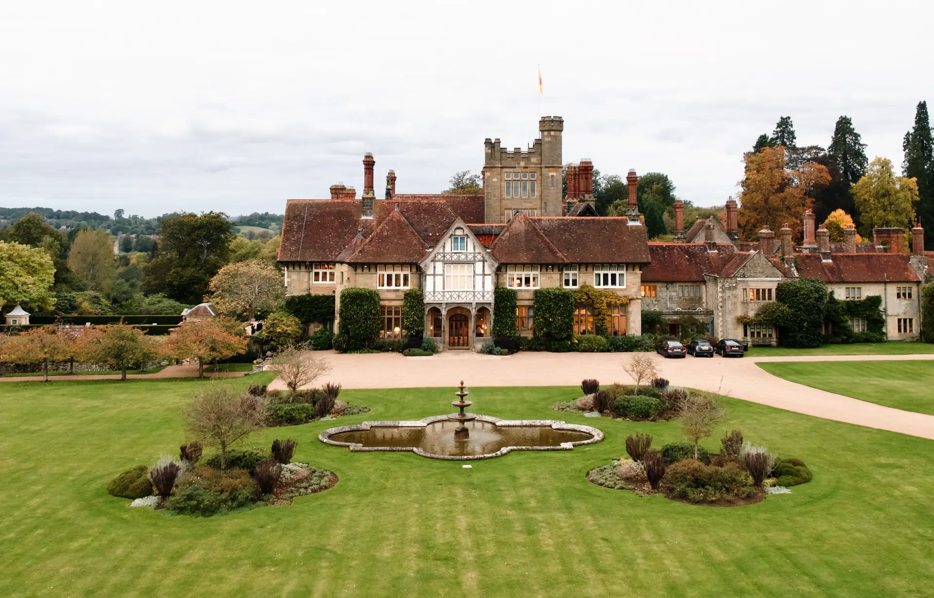 Elegant wedding ceremony at Cowdray House gardens