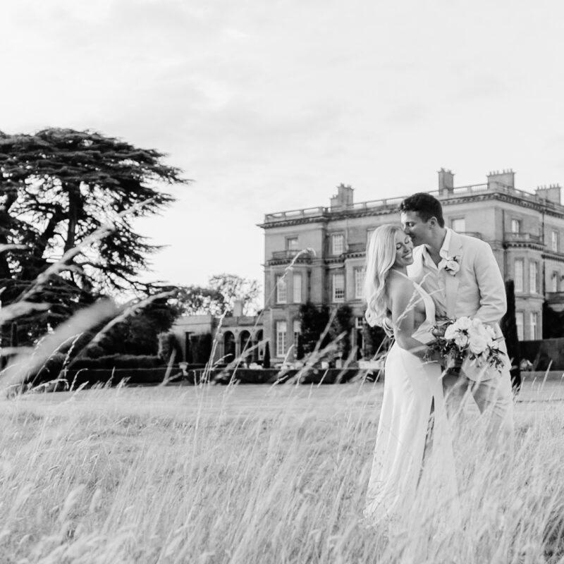 Romantic outdoor wedding ceremony at Hedsor House with floral arch by Lavender Green Flowers